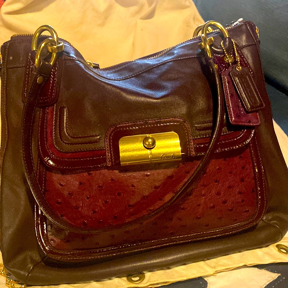 Vintage leather Coach burgundy colored